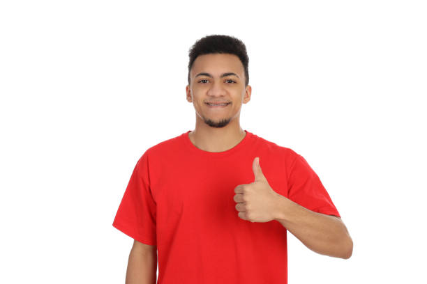 istock Young man in red t-shirt isolated on white background 2183117365