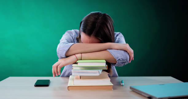 istock Bored College Student In Classroom With Fatuqie 2183118634