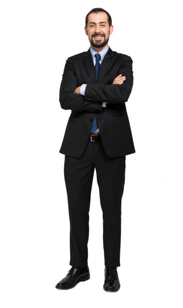 istock Smiling businessman standing with arms crossed on white background 2183122403