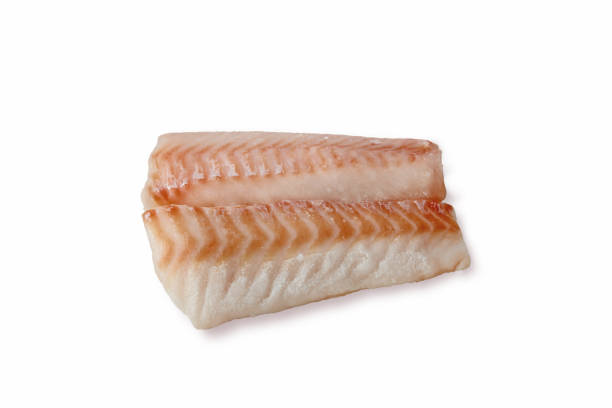 istock two pieces of fresh frozen cod fish isolated on white background 2183123144