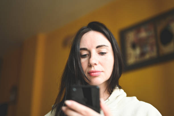 istock Woman looking at mobile phone. 2183124822