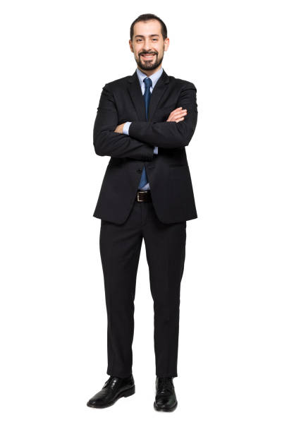 istock Smiling businessman standing with arms crossed on white background 2183124923
