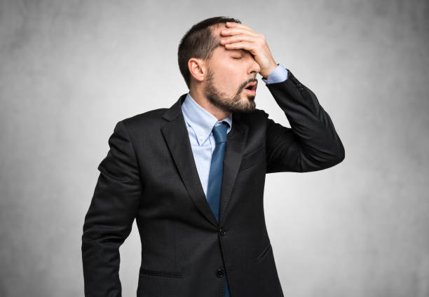 istock Stressed businessman slapping his forehead expressing despair and regret 2183125611