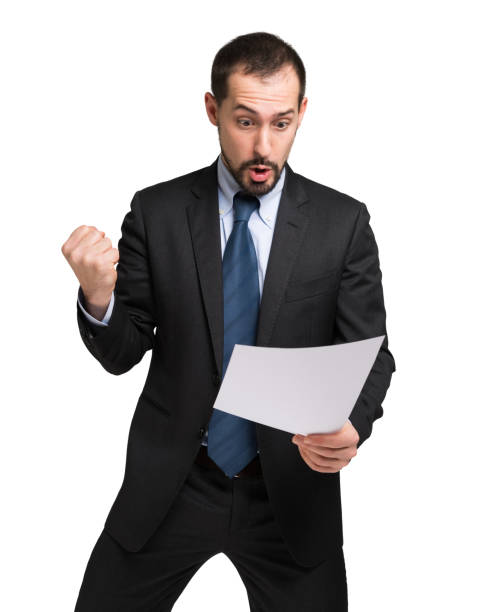 istock Excited businessman reading good news on document 2183125671