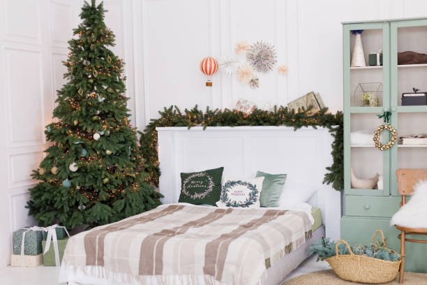 istock Cozy bedroom with Christmas tree 2183131041