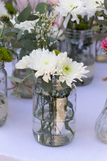 istock glass vases with white flowers 2183139650