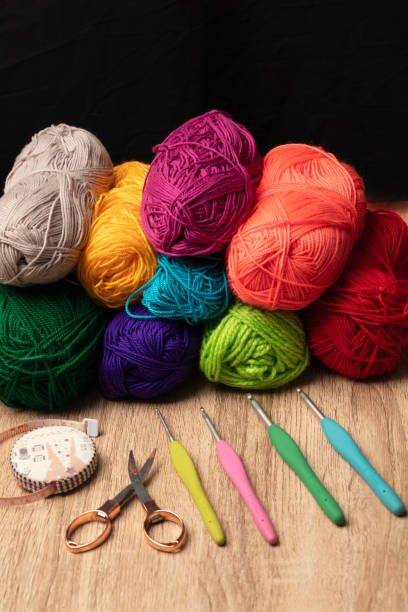 istock materials for knitting, wool, crochet, measuring tape, scissors 2183140178