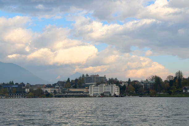 Traditional architecture and beautiful autumn foliage on the coast of Lake Bled, Slovenia.