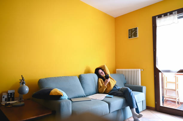 woman-using-smartphone-while-relaxing-on-sofa-at-home.jpg?s=612x612&w=0&k=20&c=WpOmx4G728cjlQx-oIevscBVtV8GISwu7WQvUR1yKy4=