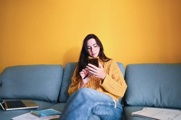istock Calculating Her Finances at home. 2183150732