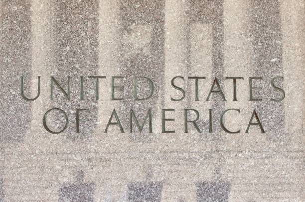 istock Our Countries Name Etched In Marble On A Building 2183156164