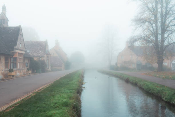 Brick-built cottage on a winters morning, Clifford Chambers, Warwickshire, England.