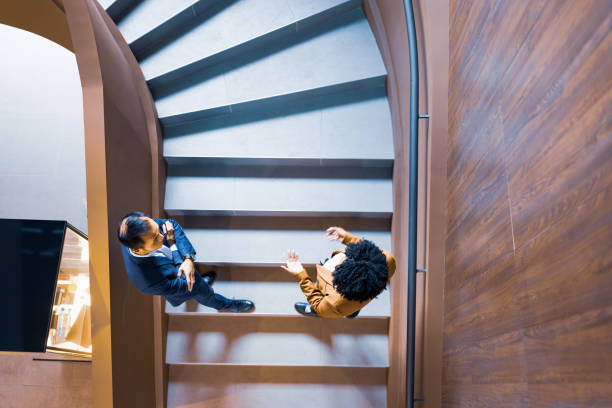 Business Meeting on Spiral Staircase