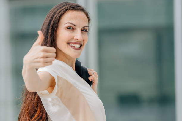 istock business woman with okay gesture 2183162210