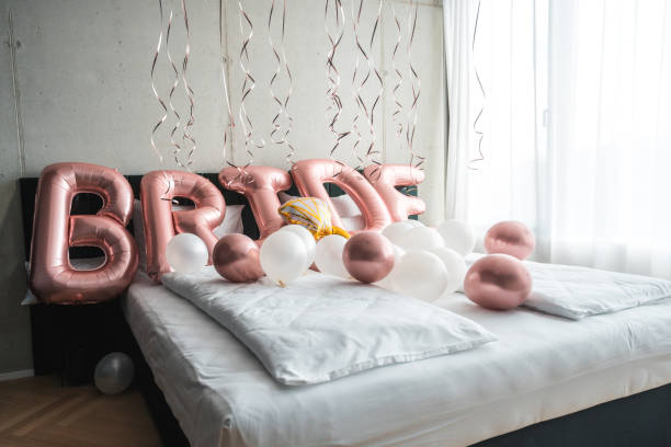 istock Bed Adorned with Charming Balloon Decorations in Hotel Room 2183167711