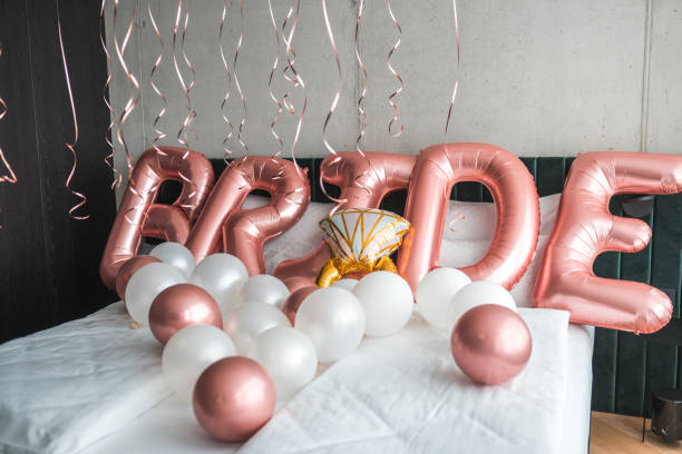 istock Charming Balloon Decorations Await the Bride on the Bed 2183178931