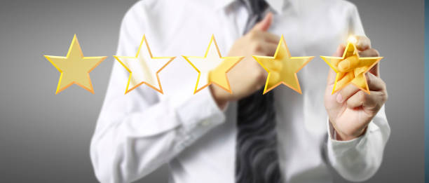 istock Rise on increasing five stars in human hand 2183184896