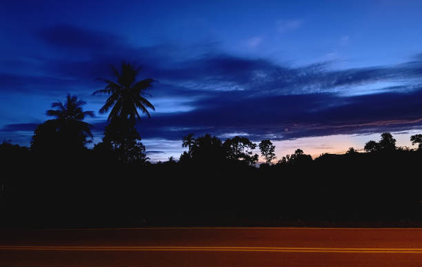 empty road at side view countryside during sunrise sky