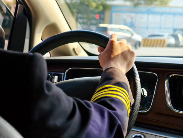 istock The driver drives with both hands on the steering wheel. 2183188886