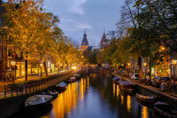 istock Enchanting autumn nights in Amsterdam with shimmering canals and glowing trees 2183190864