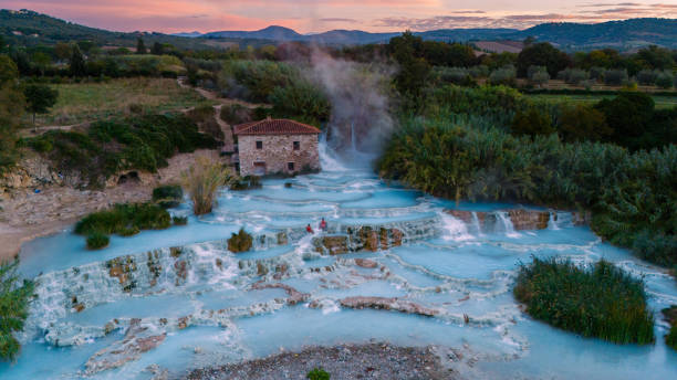 istock Relaxing at Saturnia thermal baths in Tuscany enchanting landscape during sunset 2183190991