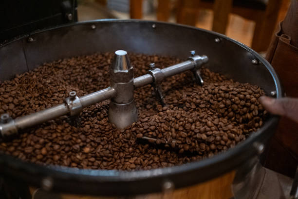 istock Freshly roasted coffee beans in the cooling tray 2183192982