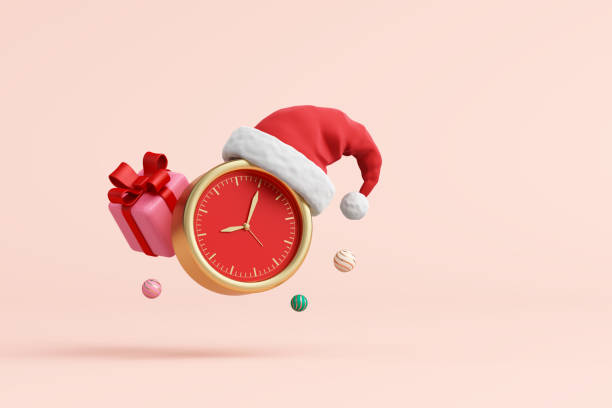 Gold classic analog clock with red santa hat, balls, gift box on pink background. Countdown to new year or merry christmas festival. Christmas ornaments. Object with clipping path. 3D Illustration.