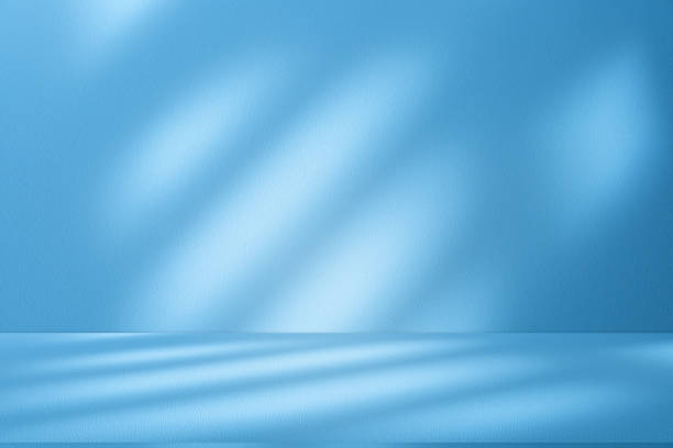 istock Wall interior background, studio, and backdrops show products. with shadow from window color white and blue light. background for text insertion and presentation of product 2183194879