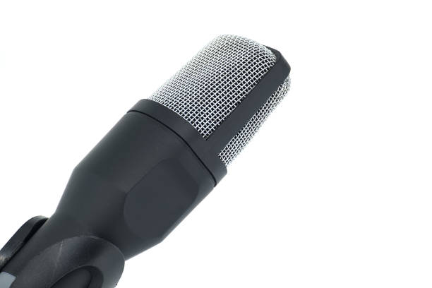 istock Close-up of a professional microphone on a stand, isolated on a white background 2183198051