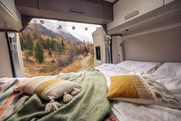 istock Cozy Camper Van Interior with Scenic Autumn Mountain View 2183209983