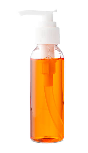 istock Clear glass bottle with a white pump dispenser containing liquid 2183213716
