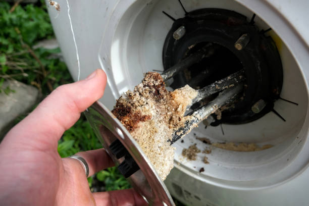 istock Electric water heater heating element, worn and covered with limescale. 2183218638
