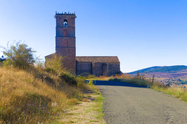 istock A small church with a bell tower sits on a dirt road 2183218984