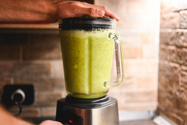 istock Green vegetable juice close up. 2183222083