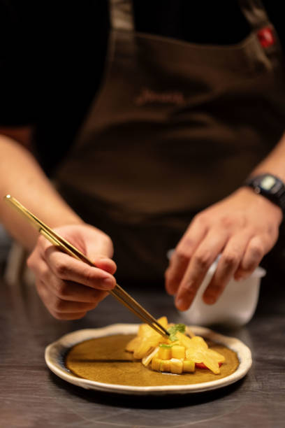 istock Close Up of Chef Had Preparing Plating Indonesian Appetizer Rujak 2183224683