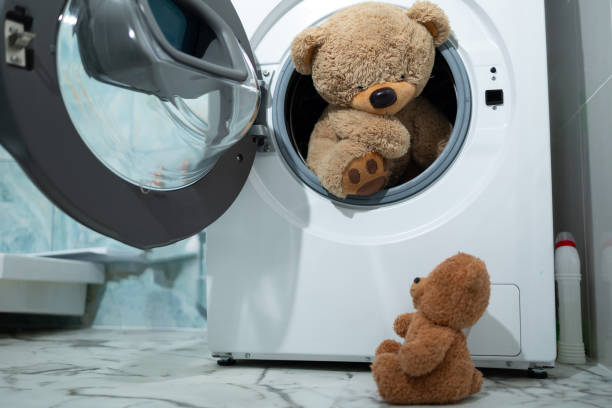 istock Adorable Teddy Bears Depicted in a Charming Washing Machine Scene, Filled with Joy 2183226369
