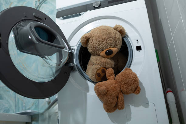 istock Teddy Bears tumble playfully in a washing machine, adding charm and fun to chores 2183226693