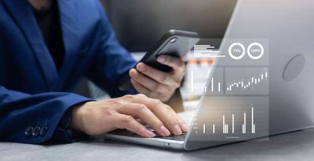 istock close up businessman typing on laptop to working and checking summary report for forecasting financial exchange market with dashboard tools monitor for futuristic technology concept 2183228140