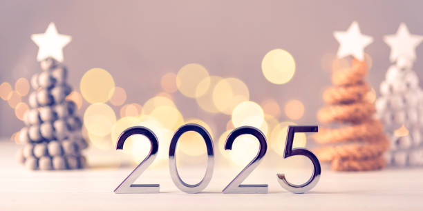 istock Metal numbers 2025 on table with bokeh lights. 2183234371