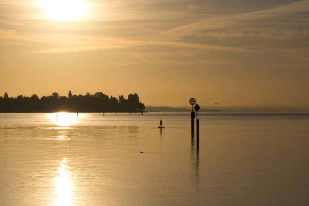 At dusk, the blue water and the golden sunlight,Natural texture background.