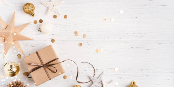 istock Festive Christmas background with gift box and Christmas decorations 2183234681