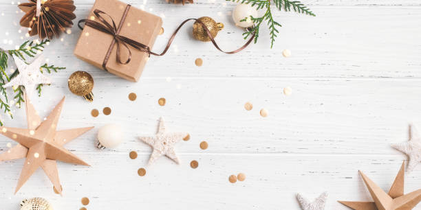 istock Festive Christmas background with gift box and Christmas decorations 2183234705