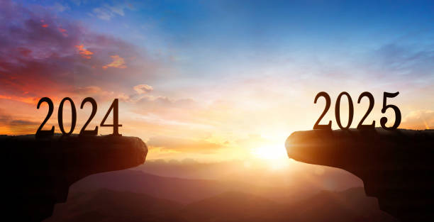 istock Between 2024 and 2025 years with Silhouette sunset background 2183235519
