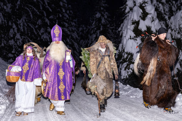 istock Celebrating winter traditions with festive characters in snow-covered landscape during nighttime festivities 2183237986