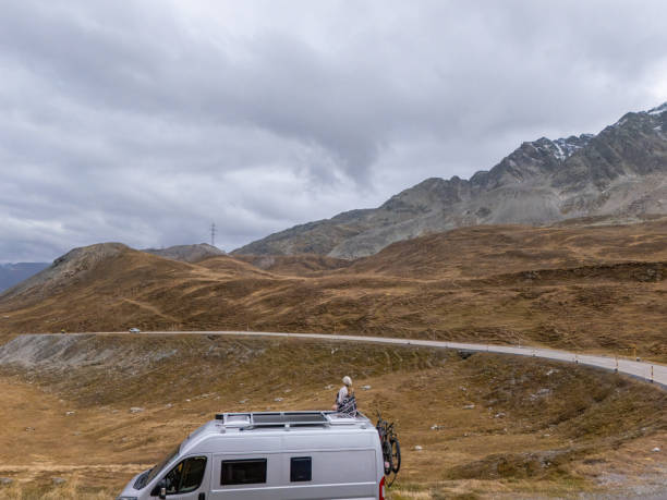 istock Camper Van Adventure in Majestic Mountain Landscape 2183238082