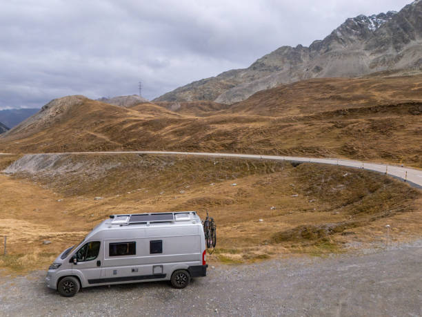 istock Camper Van in Remote Mountain Landscape on Cloudy Day 2183238997