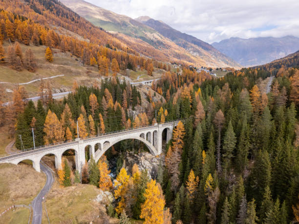 istock Scenic Stone Bridge Over Valley in Autumn Forest 2183239801