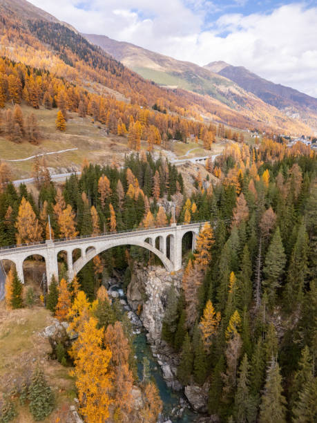 istock Majestic Stone Arch Bridge in Alpine Autumn Forest 2183239894