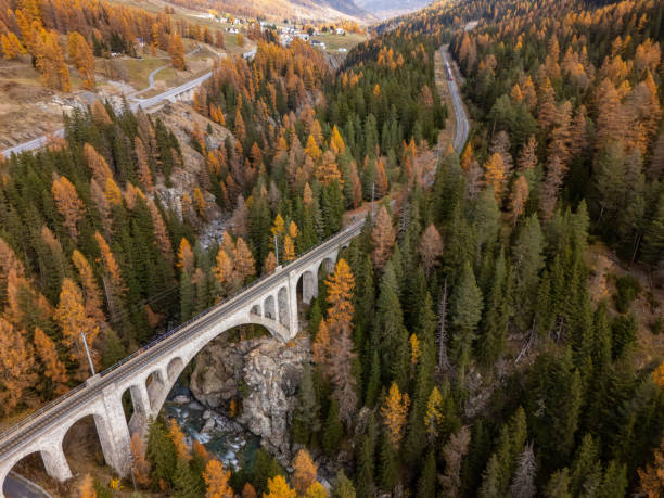 istock Majestic Stone Arch Bridge in Alpine Autumn Forest 2183239966