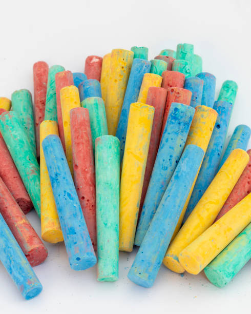 istock Chalks in a variety of colors on white background 2183245100
